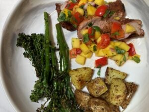 Southwest Pork Tenderloin with Mango Served with Broccoli & Roasted Potatoes Salsa