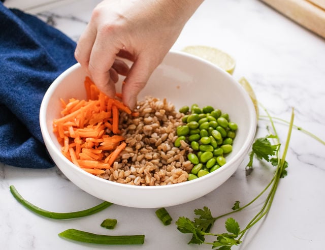 assembling tofu bowl